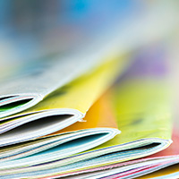 stack of colorful magazines
